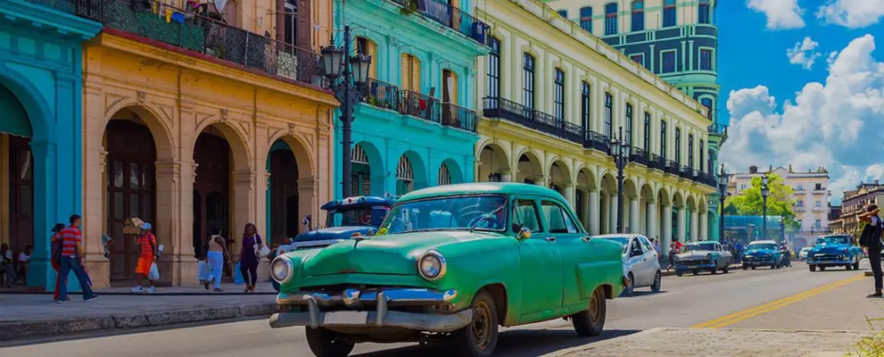 Classic Green American car in Cuban street, Cuba